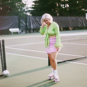 Green satin feather top.